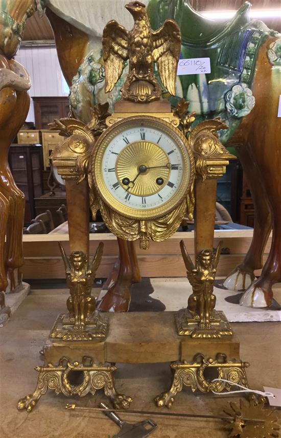 Empire style gilt metal and marble mantel clock